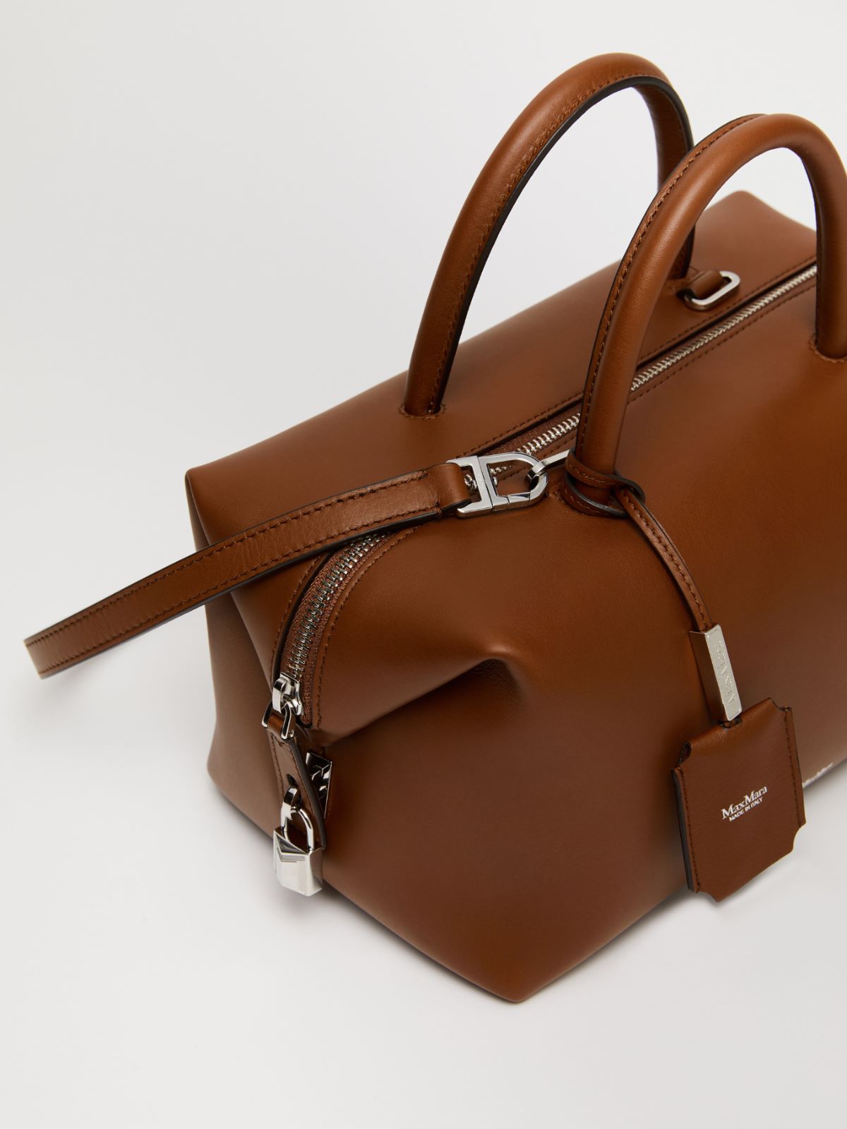 Shiny leather satchel bag