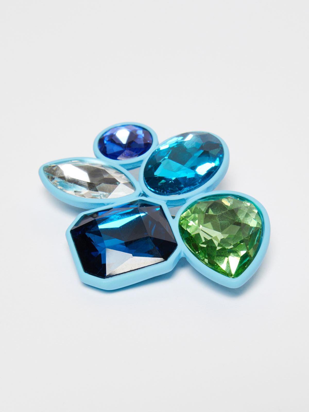 Metal and glass brooch