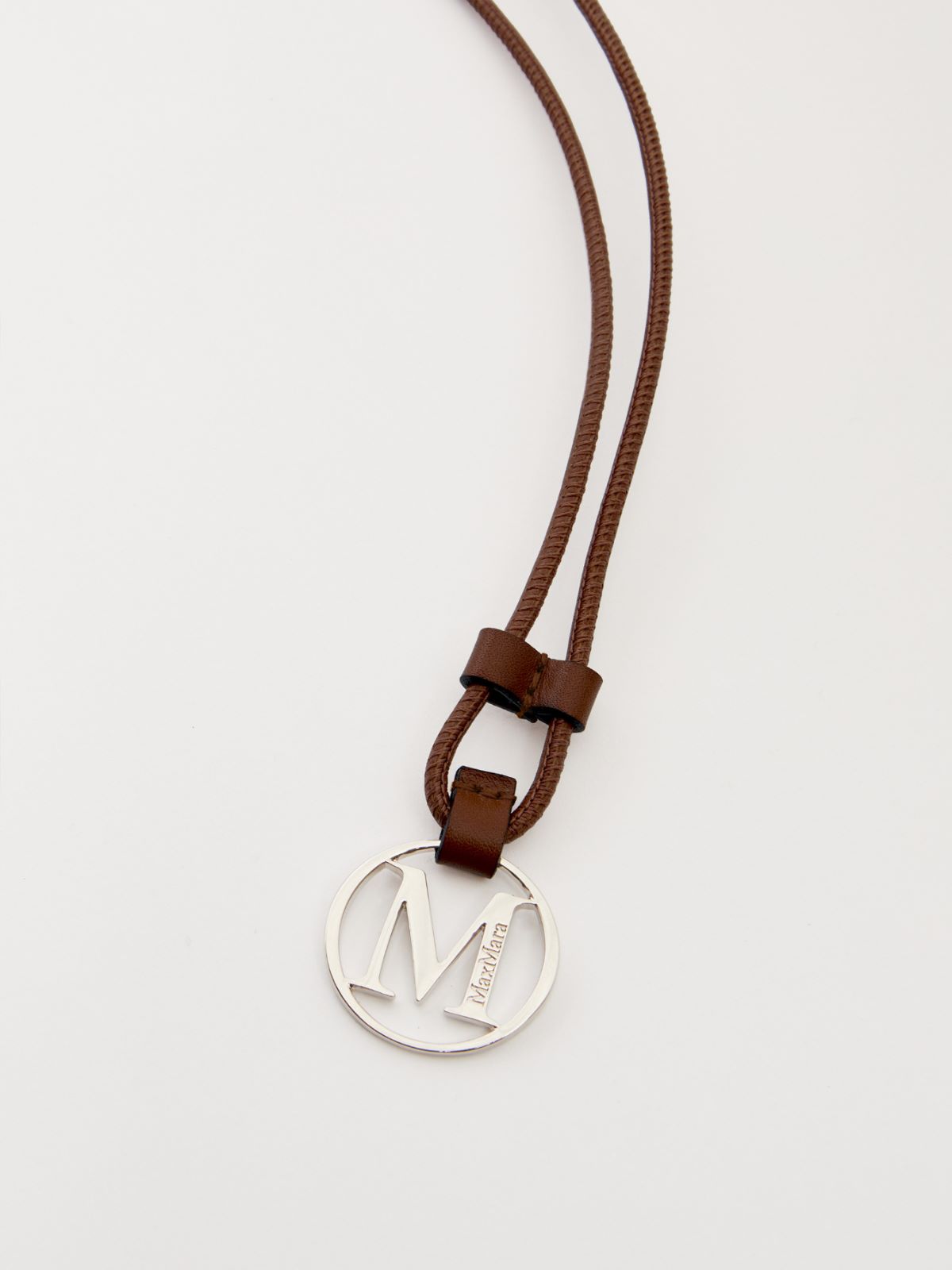 Monogram leather strap with pendant