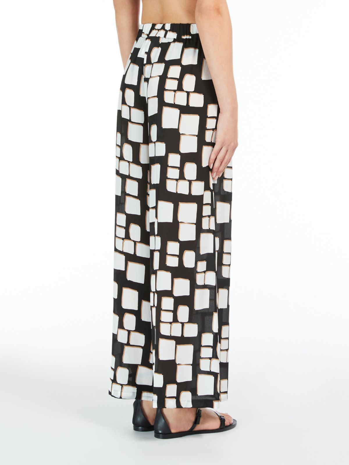 Palazzo trousers in printed silk