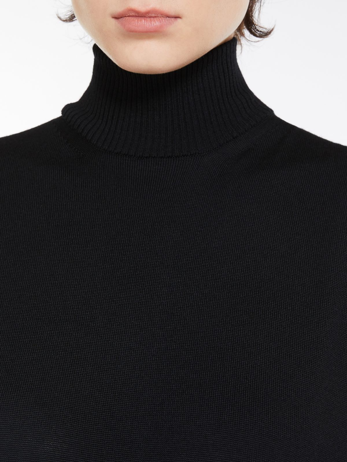 Sleeveless wool-knit jumpsuit