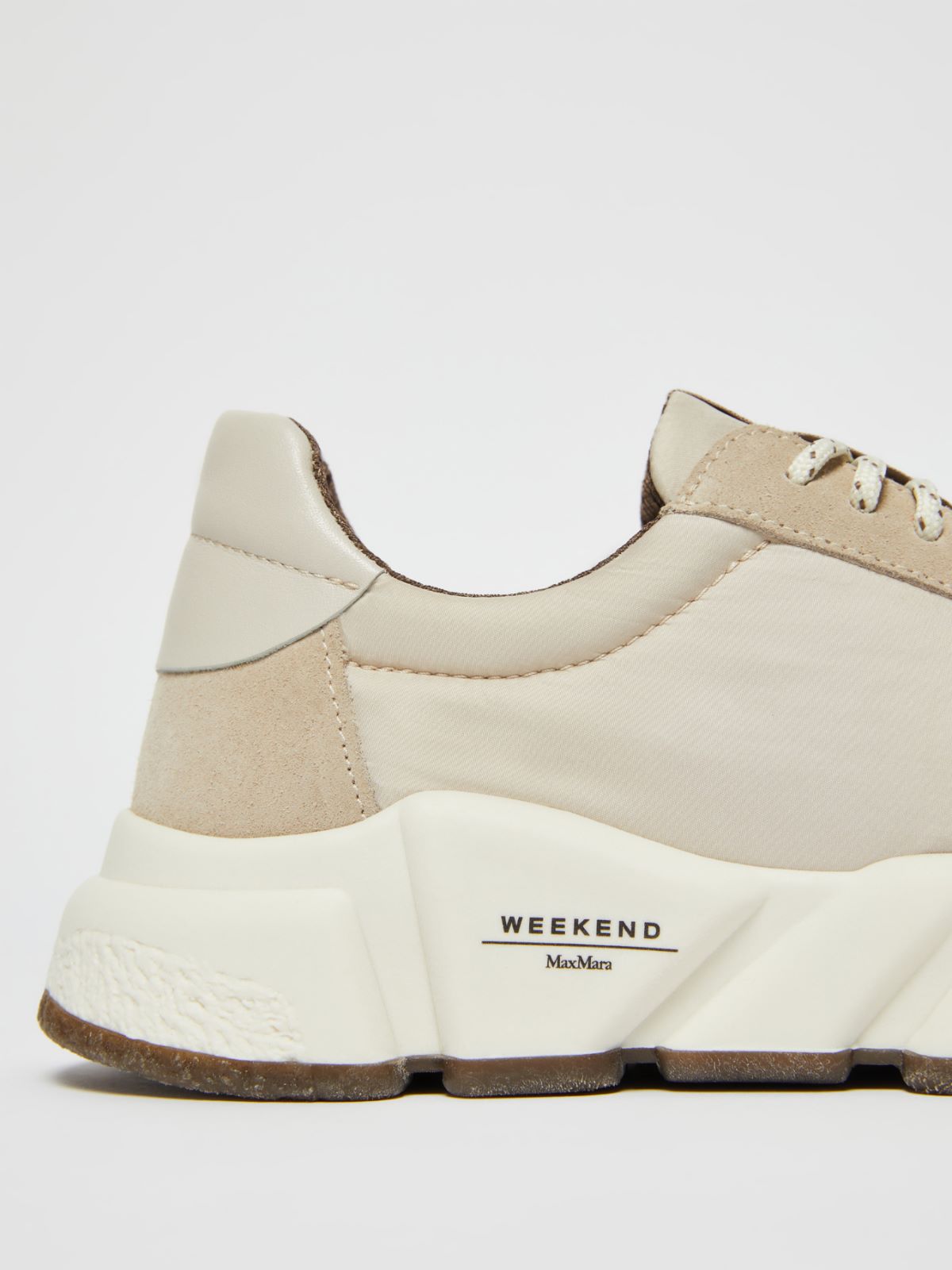 Nylon and leather running shoes