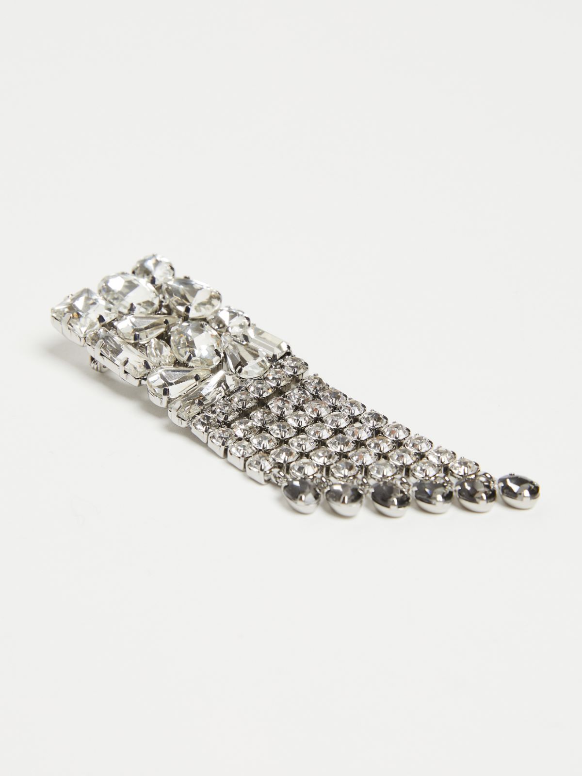 Metal and rhinestone brooch