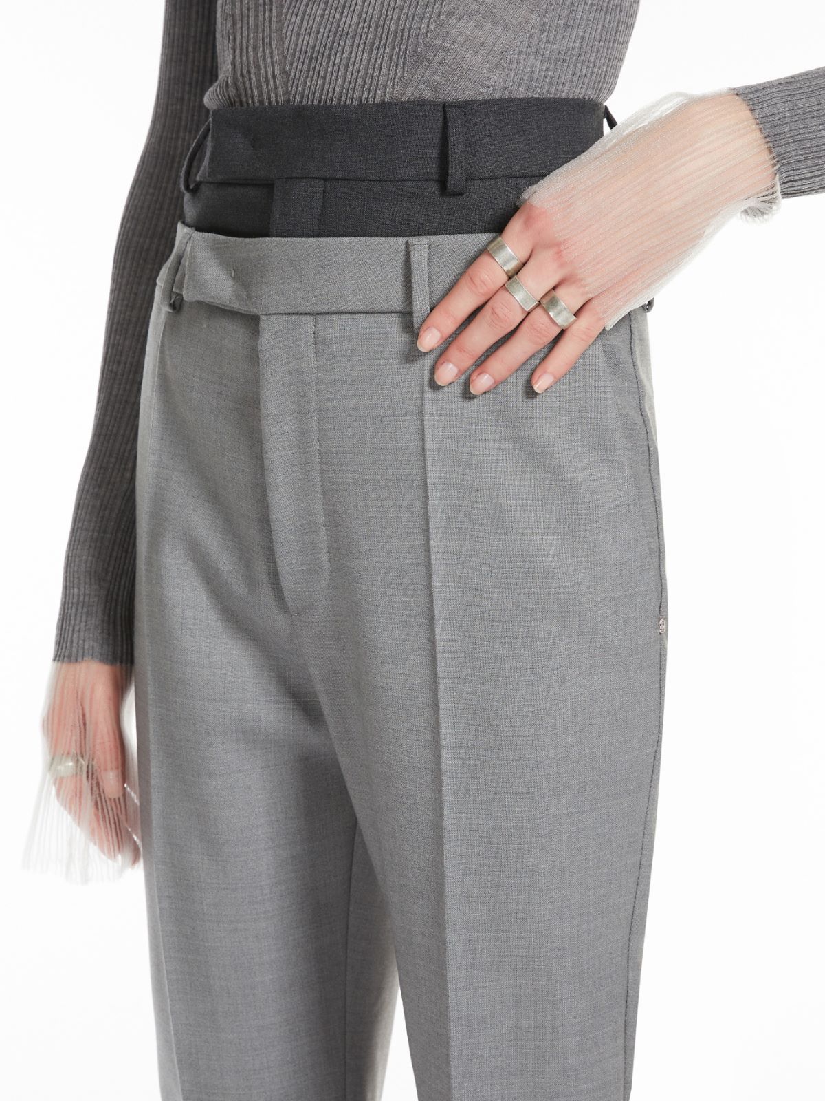 Flared trousers with a branded double belt