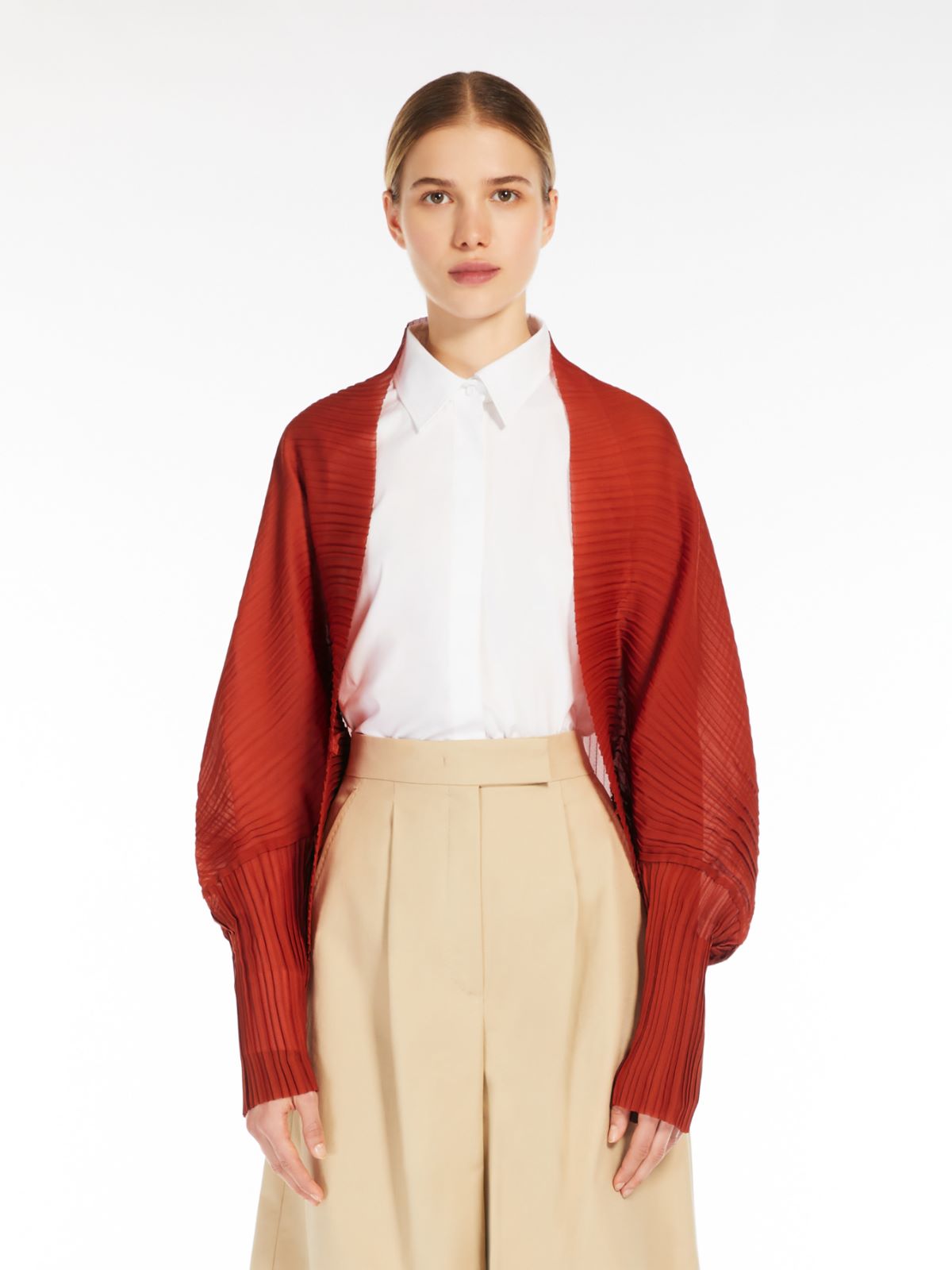 Shrug in pleated fabric