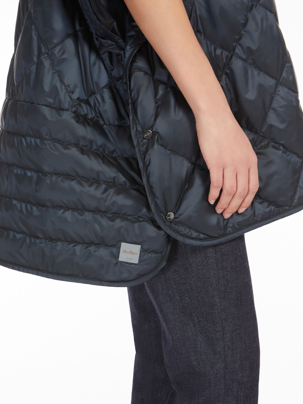 Cape with hood in water-repellent canvas