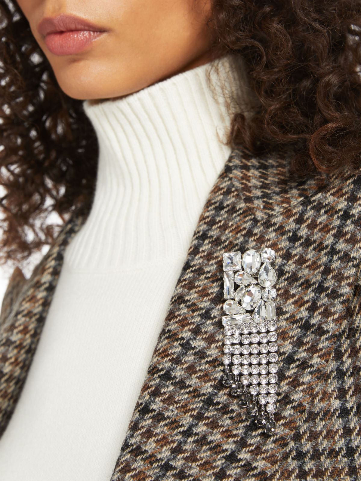 Metal and rhinestone brooch