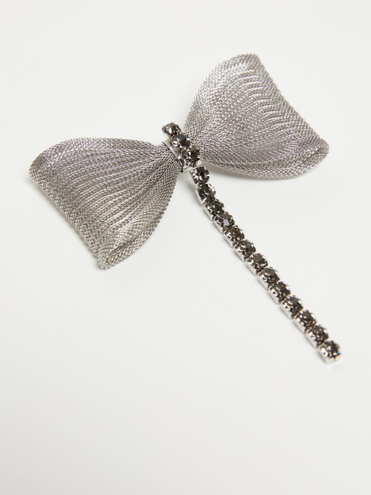 Metal and rhinestone brooch