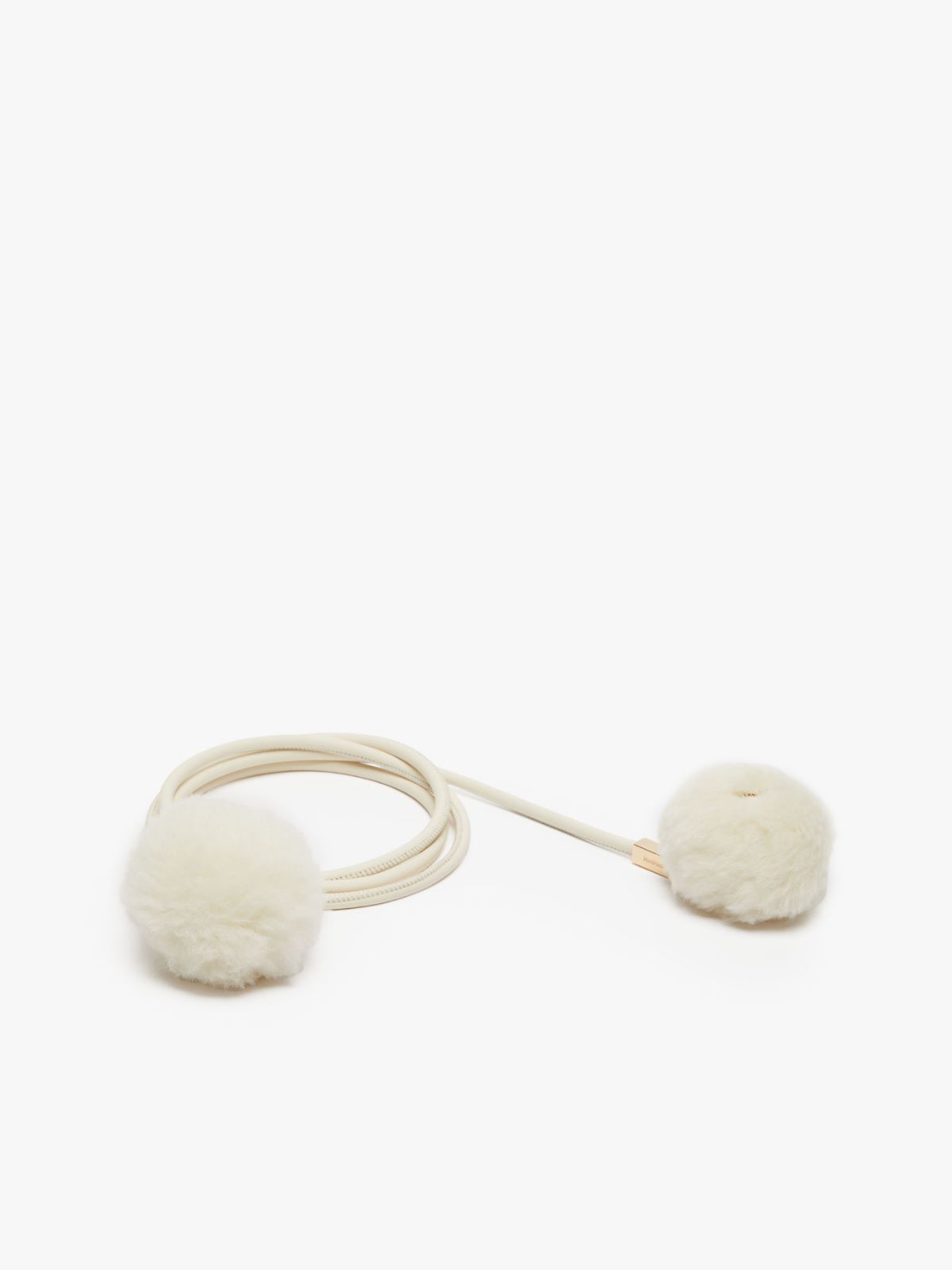 Tubular belt with pom-pom