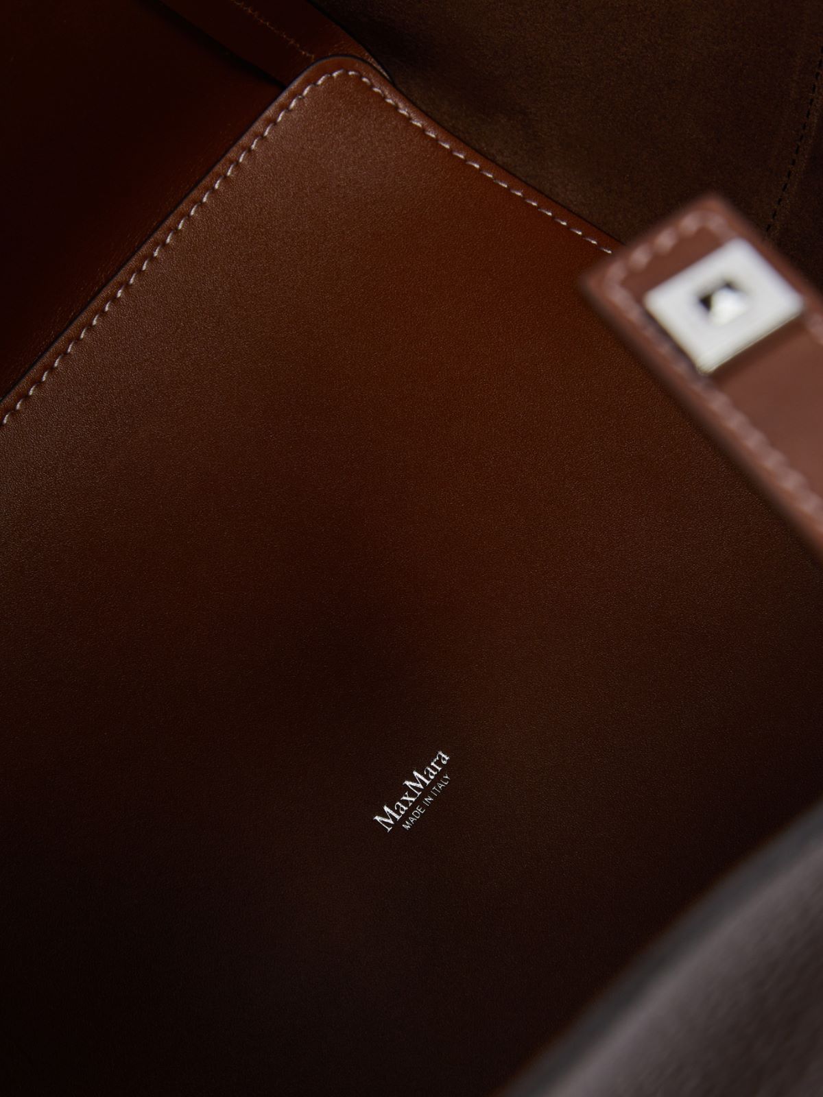 Medium bucket bag in deer-print leather