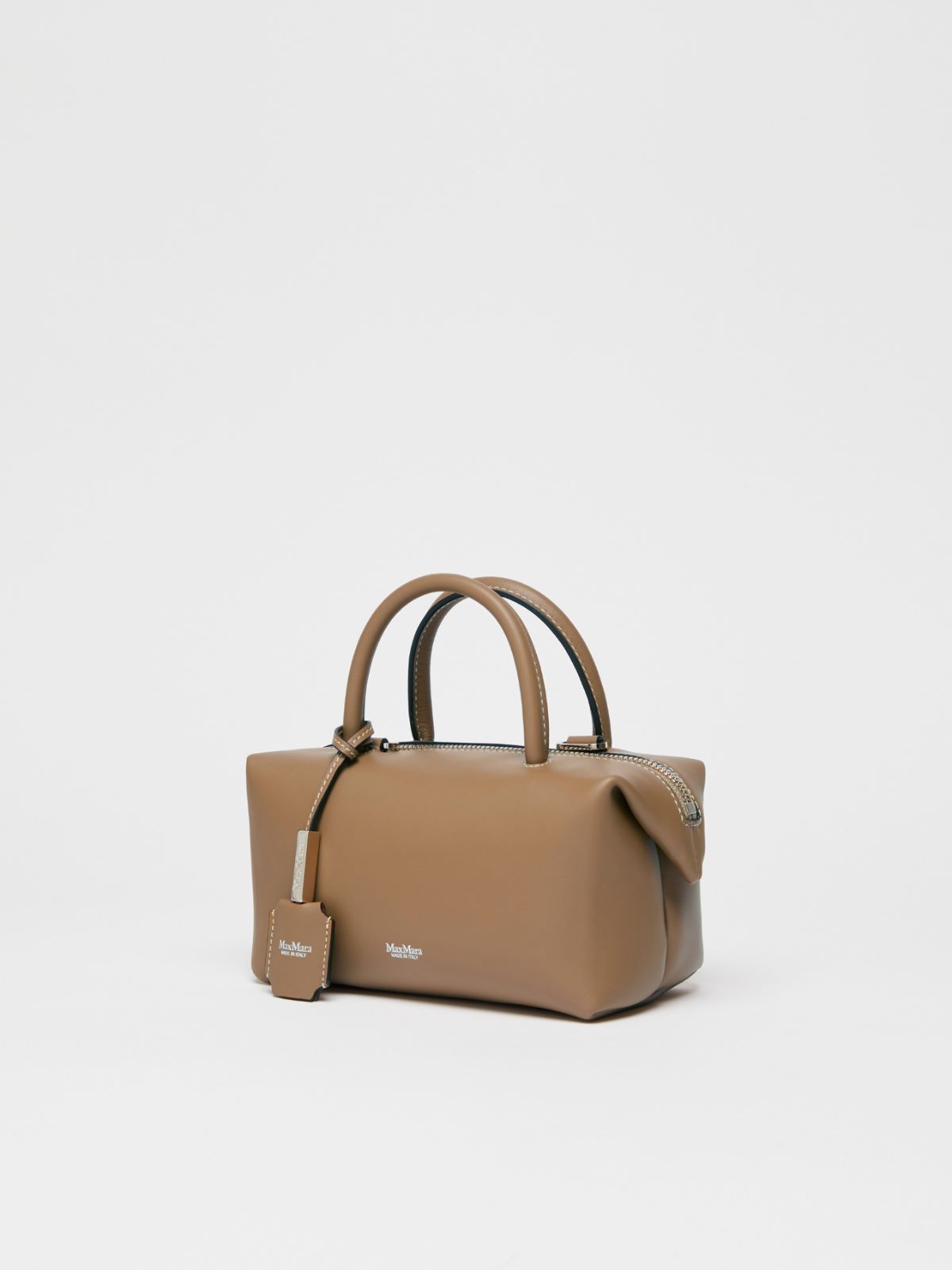 Small shiny leather satchel bag