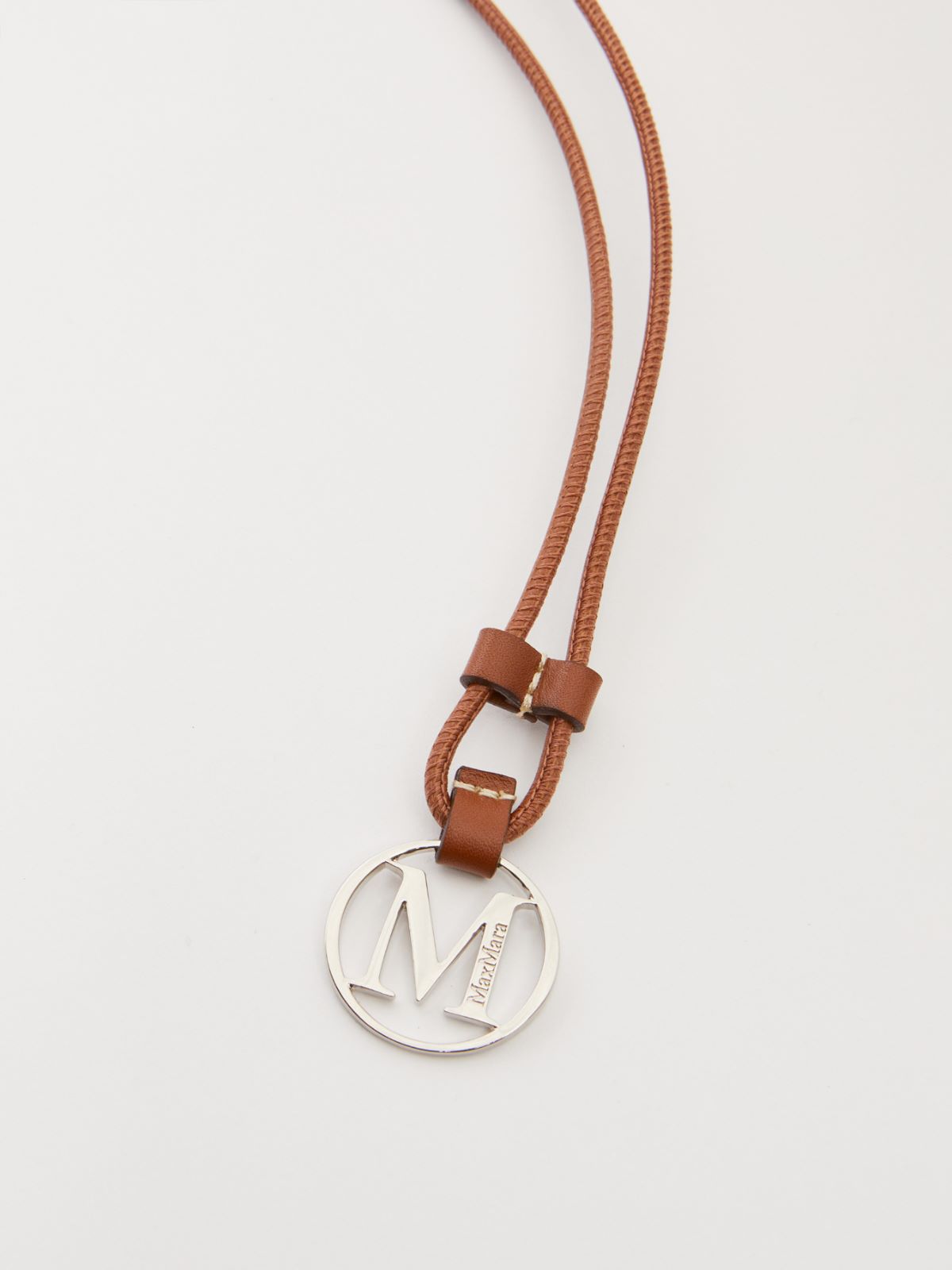 Monogram leather strap with pendant