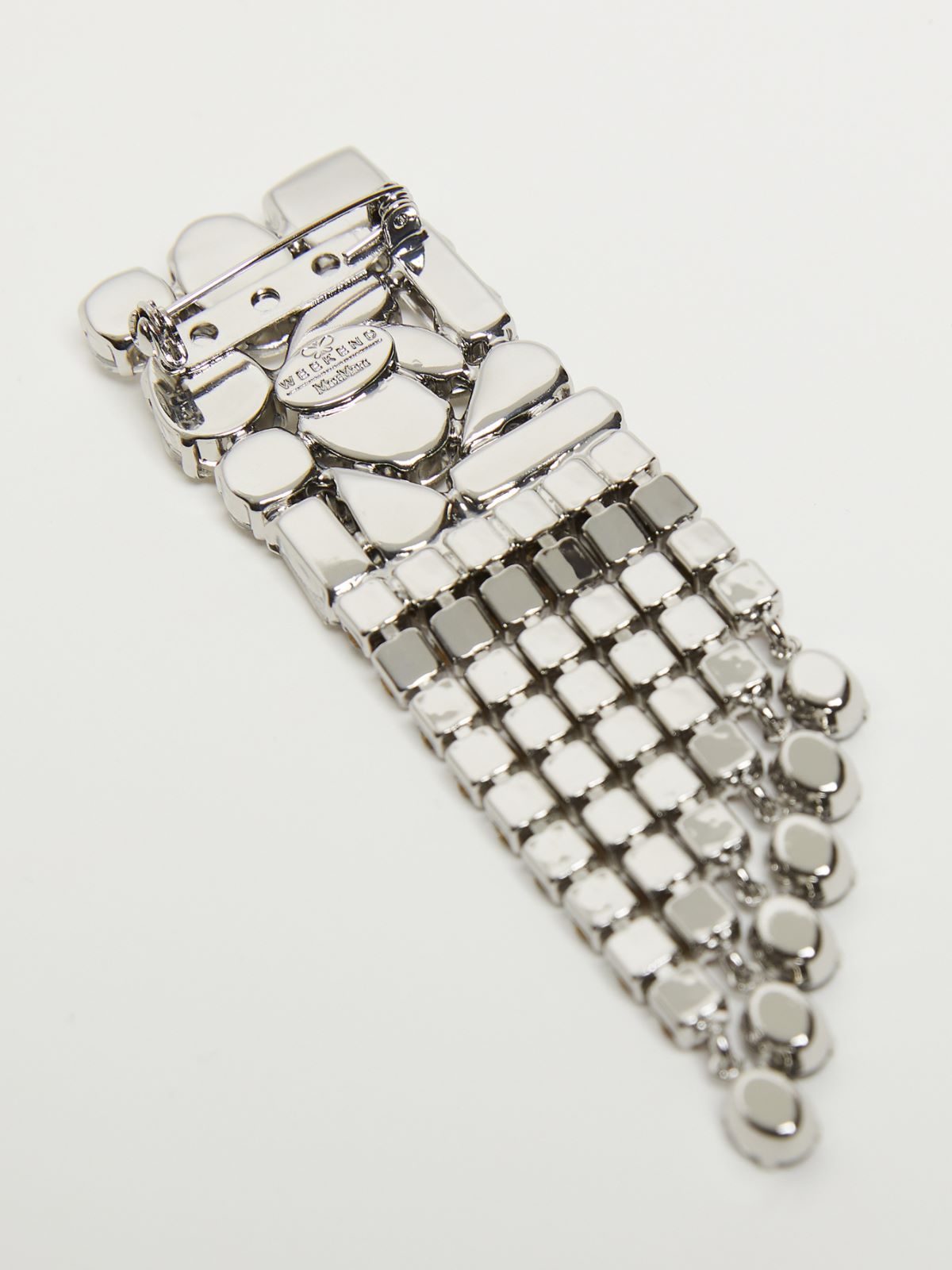 Metal and rhinestone brooch