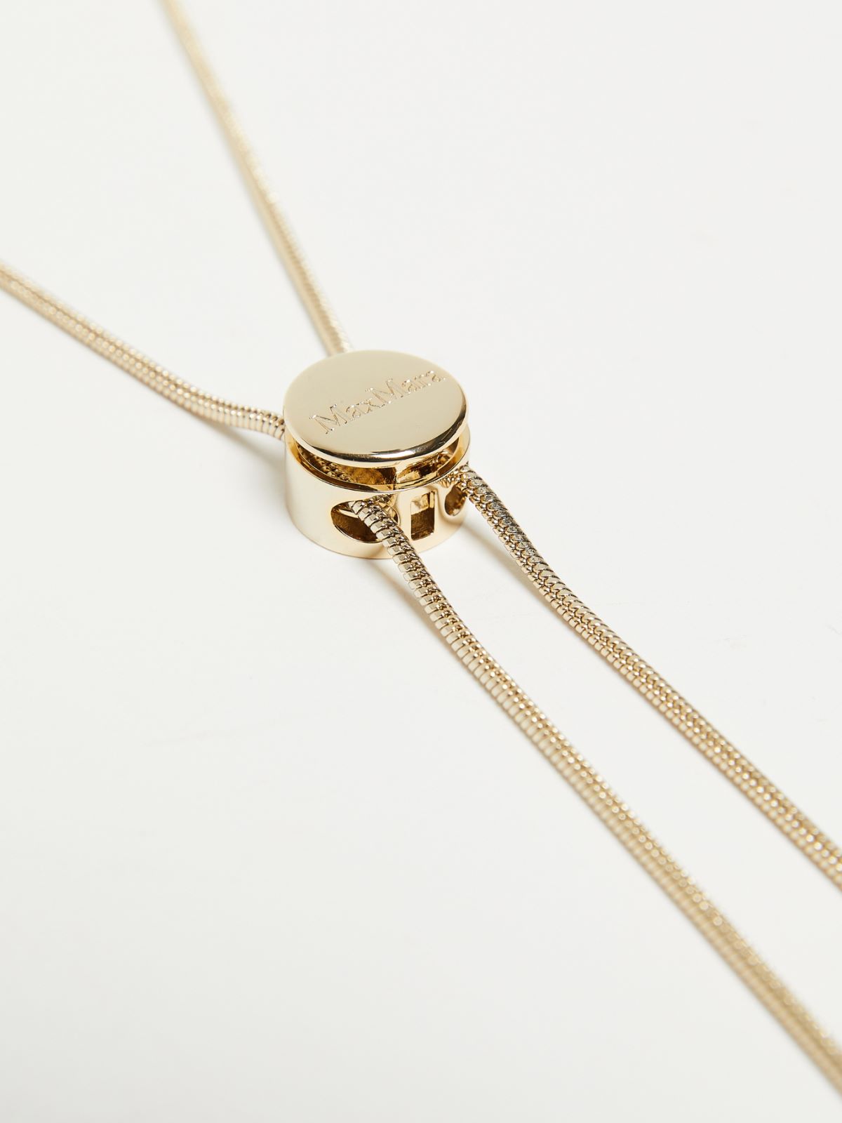 Tie necklace with tassels