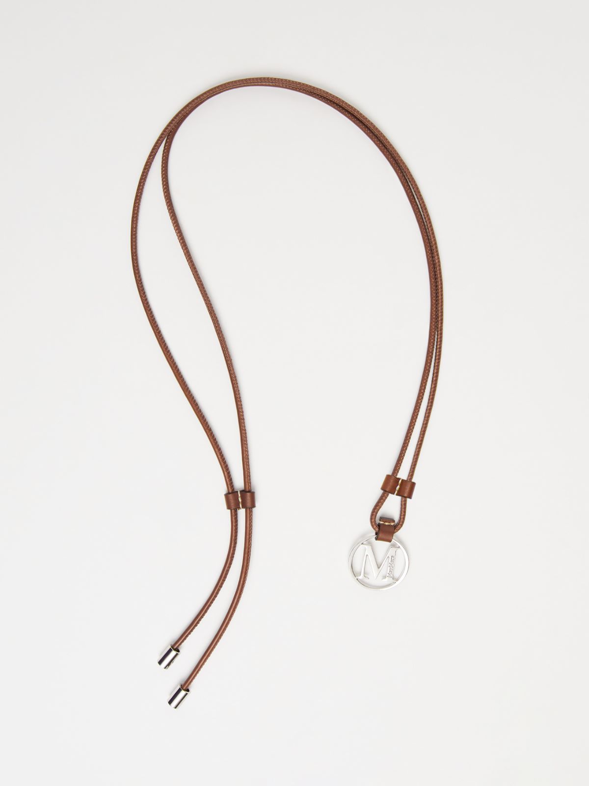 Monogram leather strap with pendant