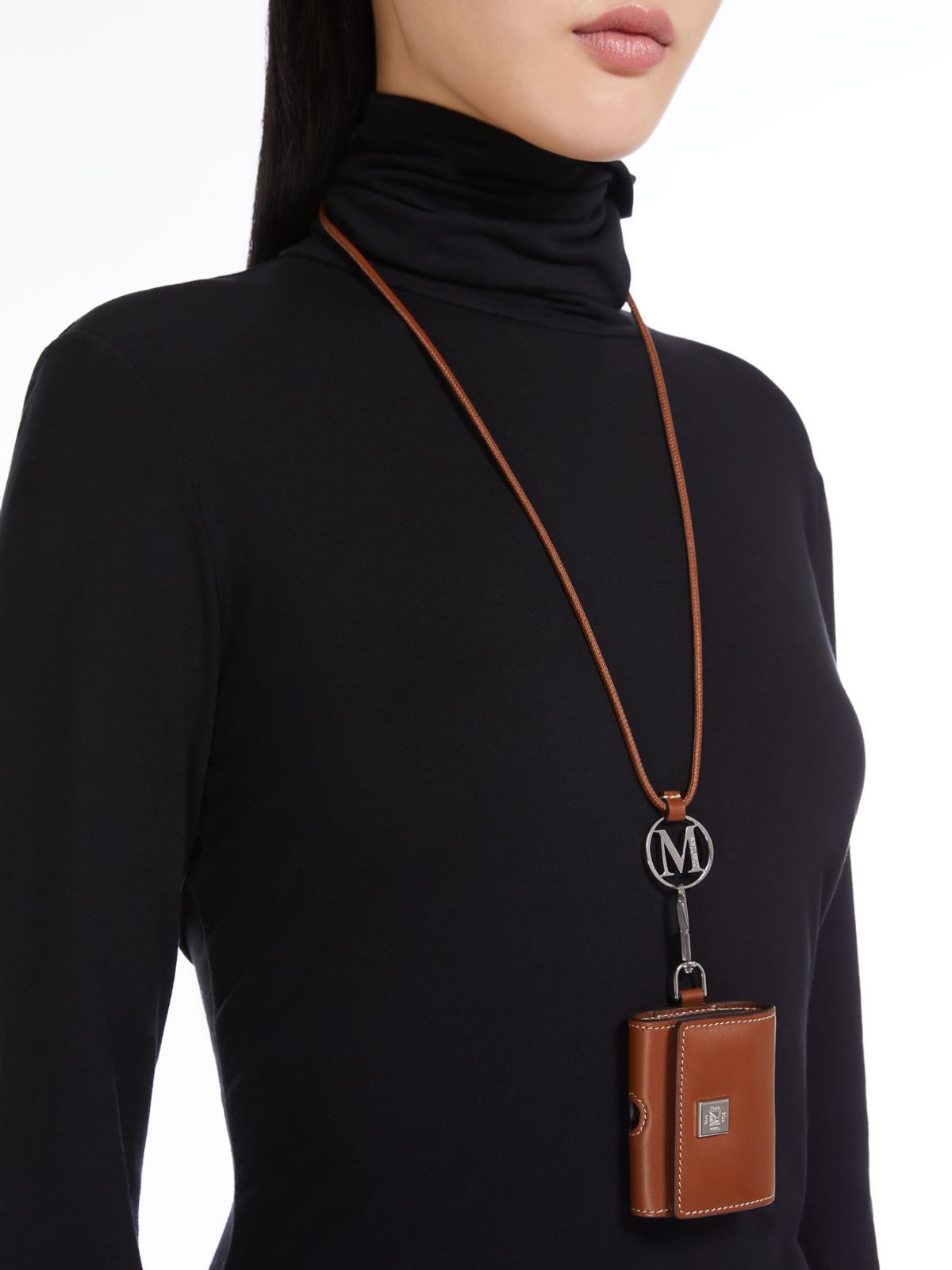 Monogram leather strap with pendant