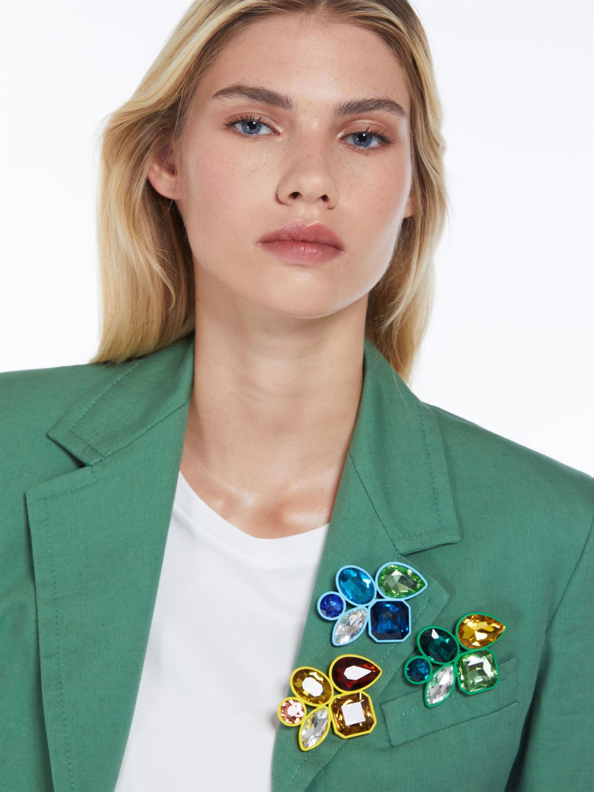 Metal and glass brooch