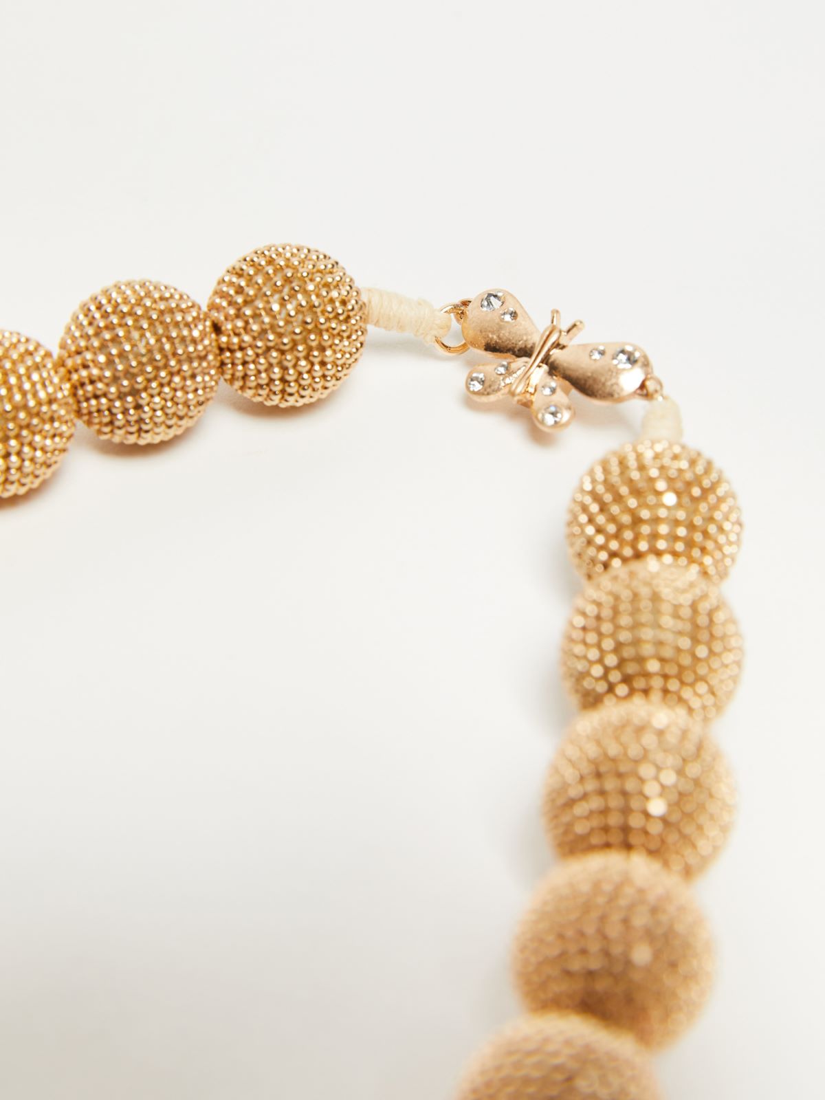 Ball-adorned choker necklace