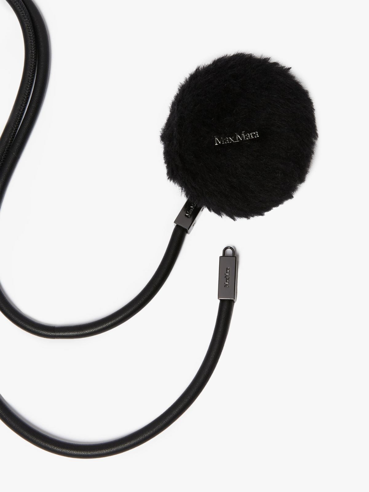 Tubular belt with pom-pom