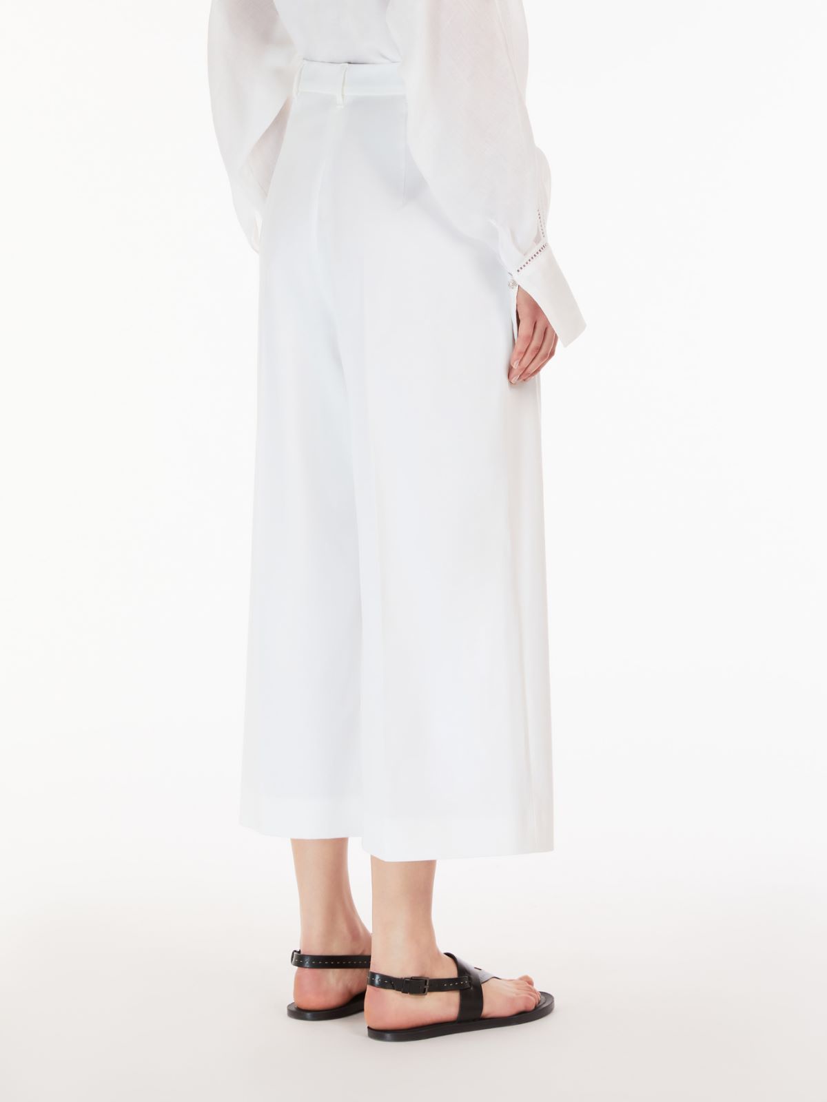 Cropped stretch cotton trousers