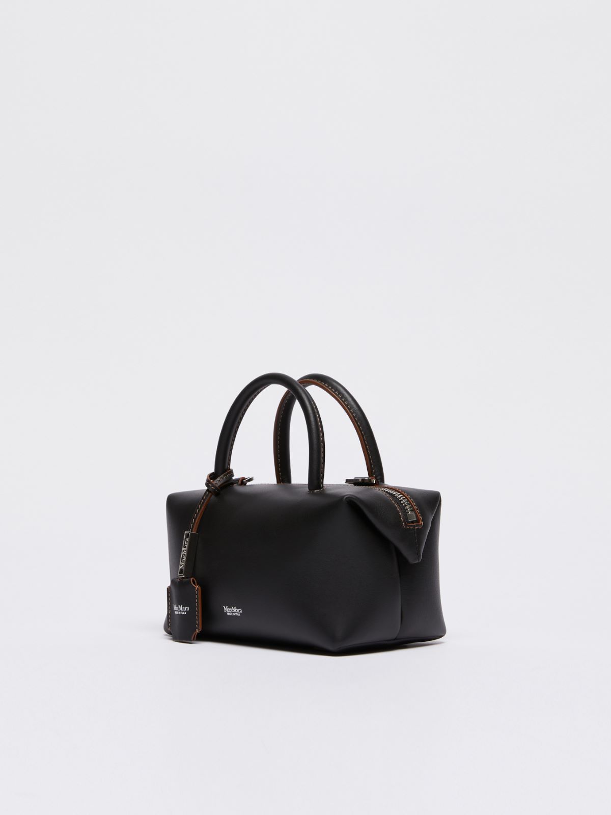 Small shiny leather satchel bag
