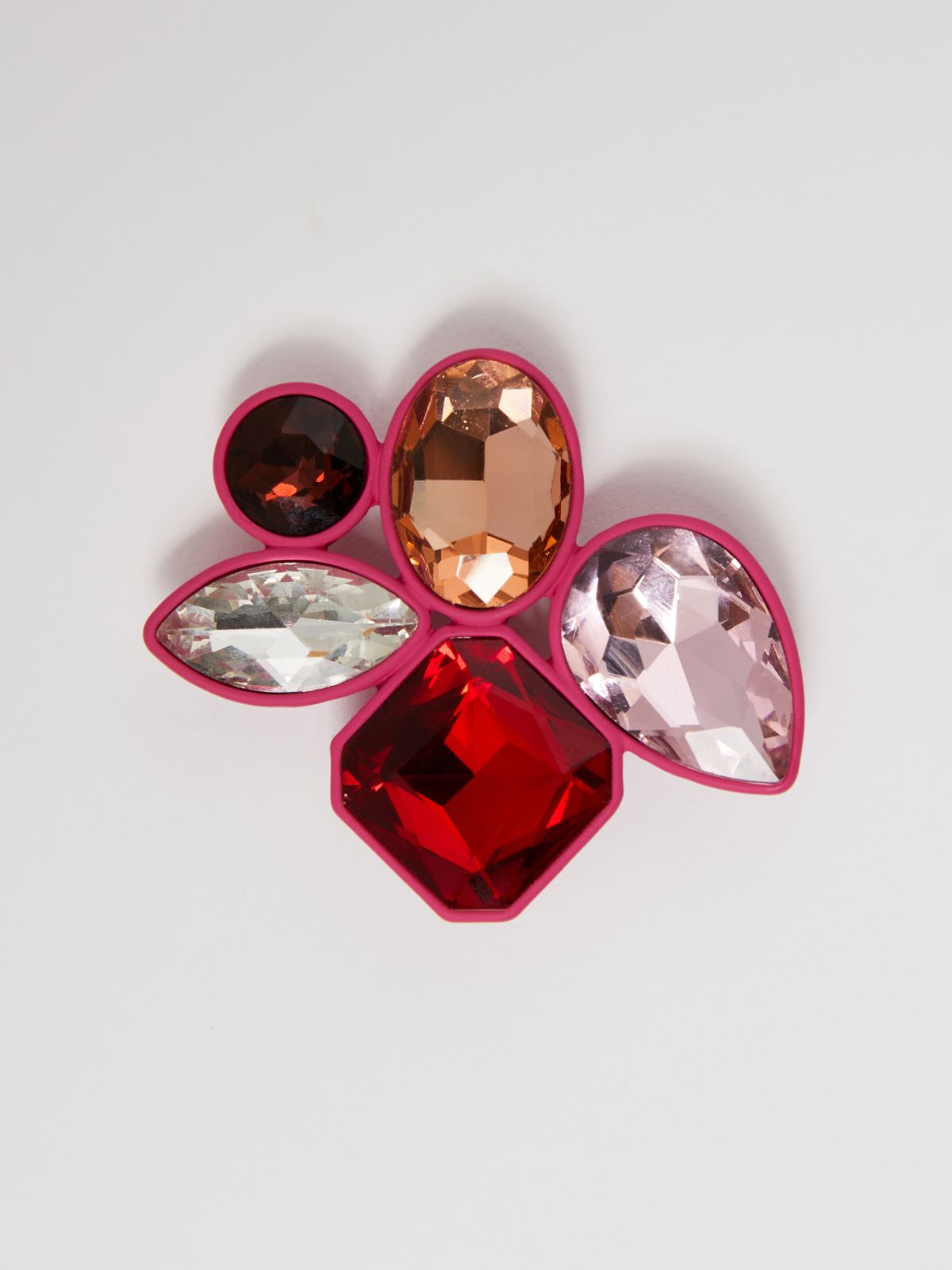 Metal and glass brooch