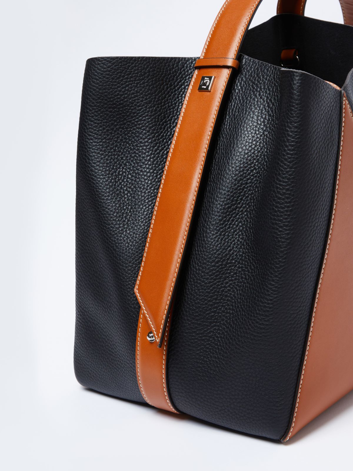 Medium bucket bag in deer-print leather