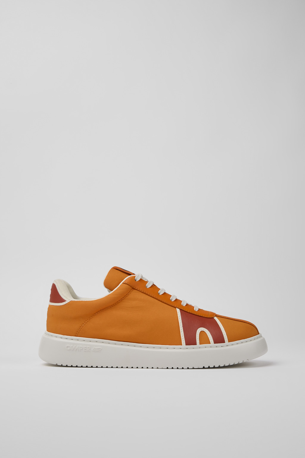 Orange, red, and white sneakers for men