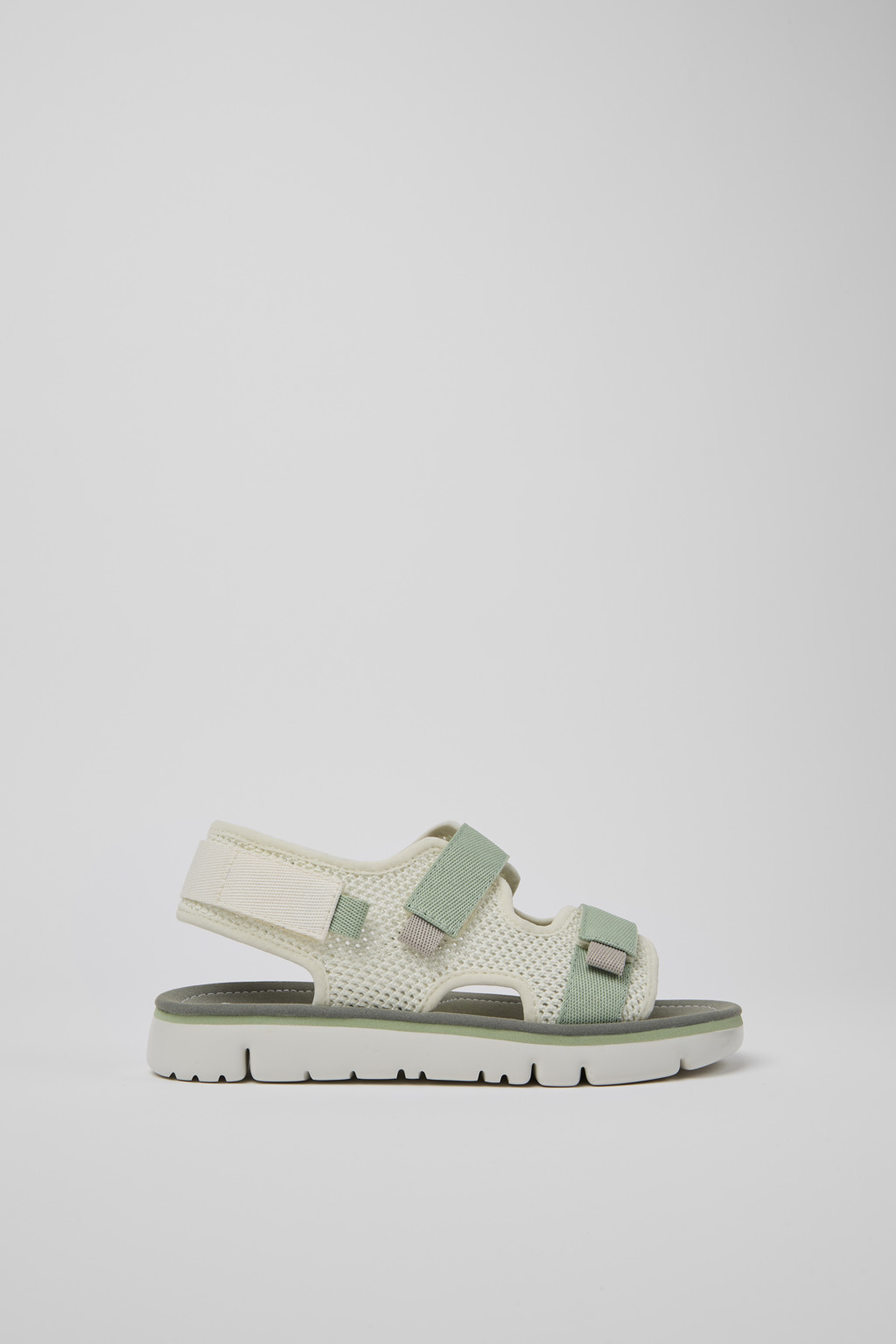 White, green, and grey sandals for women