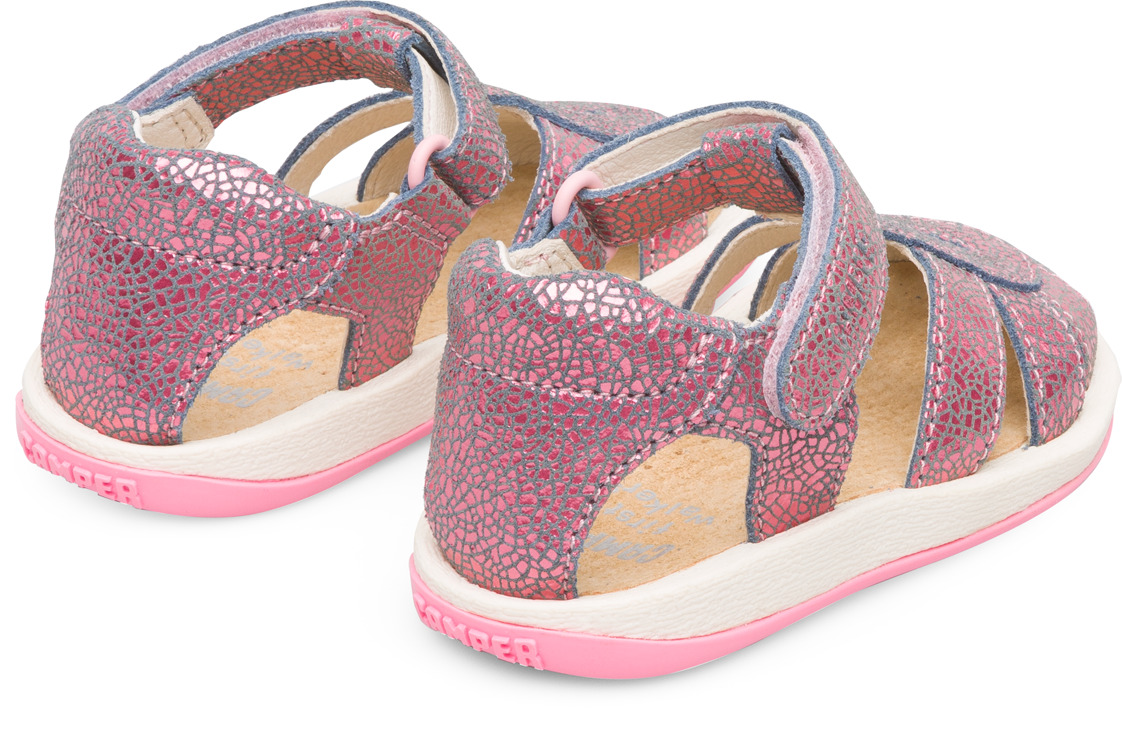 Closed pink T-strap kids’ sandal