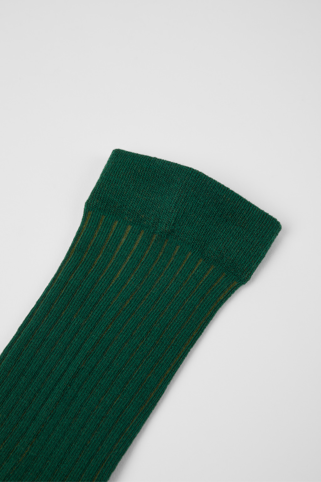 Green socks in collaboration with PYRATEX