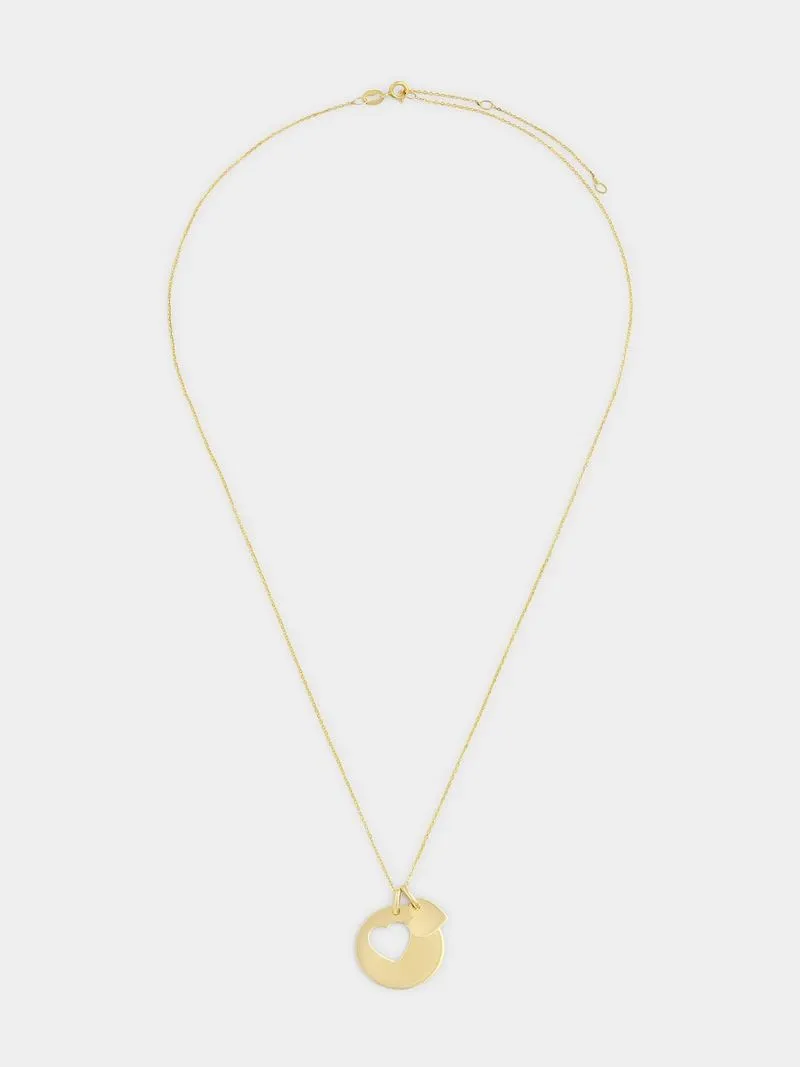 Yellow Gold Double pendant,Round Disc with heart cut-out and Plain heart on a chain.