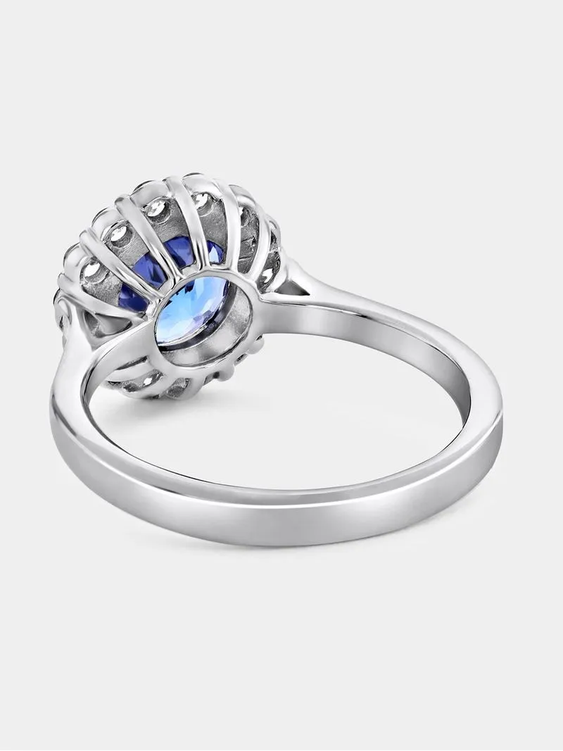 White Gold Diamond & Tanzanite Women’s Round Halo Ring