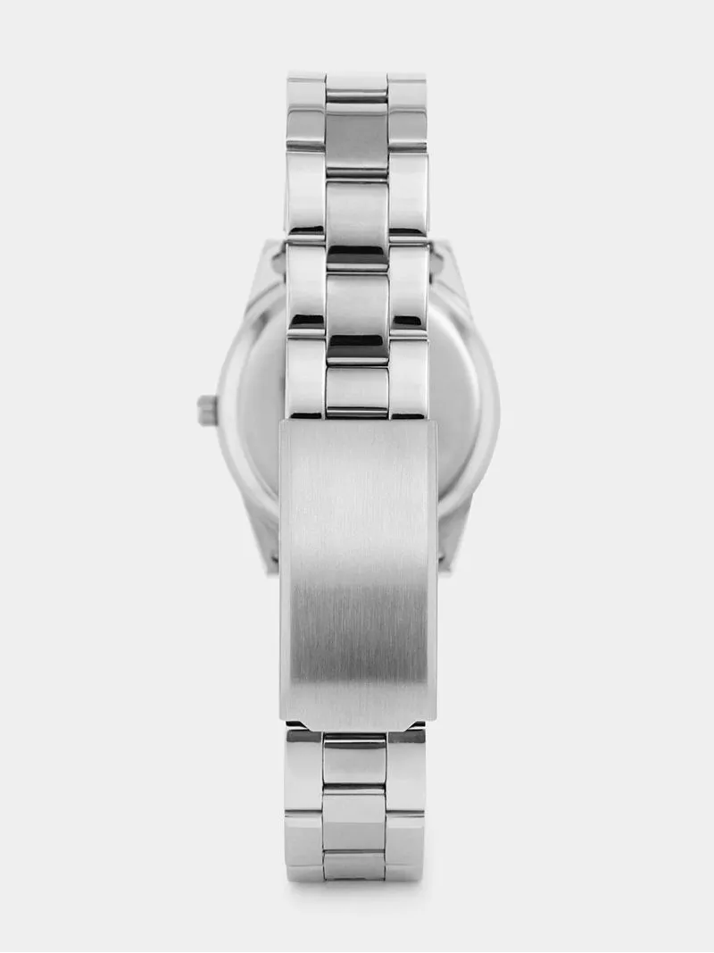 Tempo Women’s Silver Plated Coin Edge Bracelet Watch