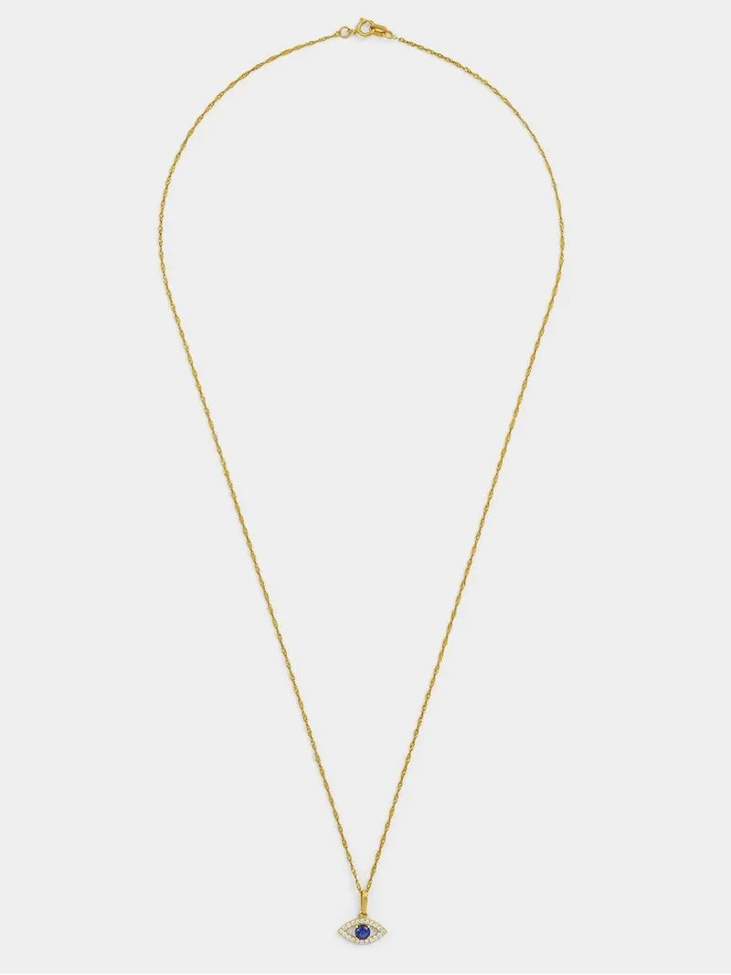 Yellow Gold Blue Cubic Zirconia Solitaire Evil Eye Pendant on a Sterling Silver and Gold chain.