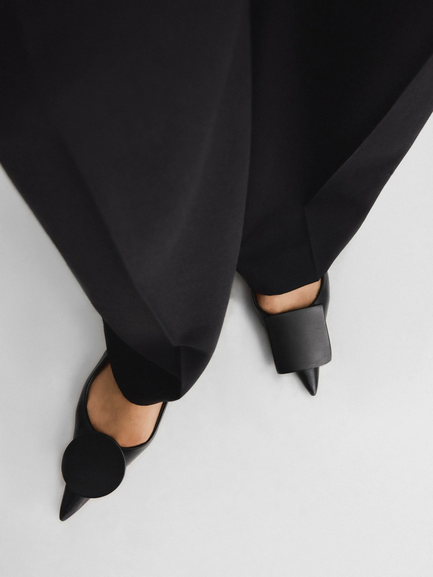 Les slingbacks Duelo plates