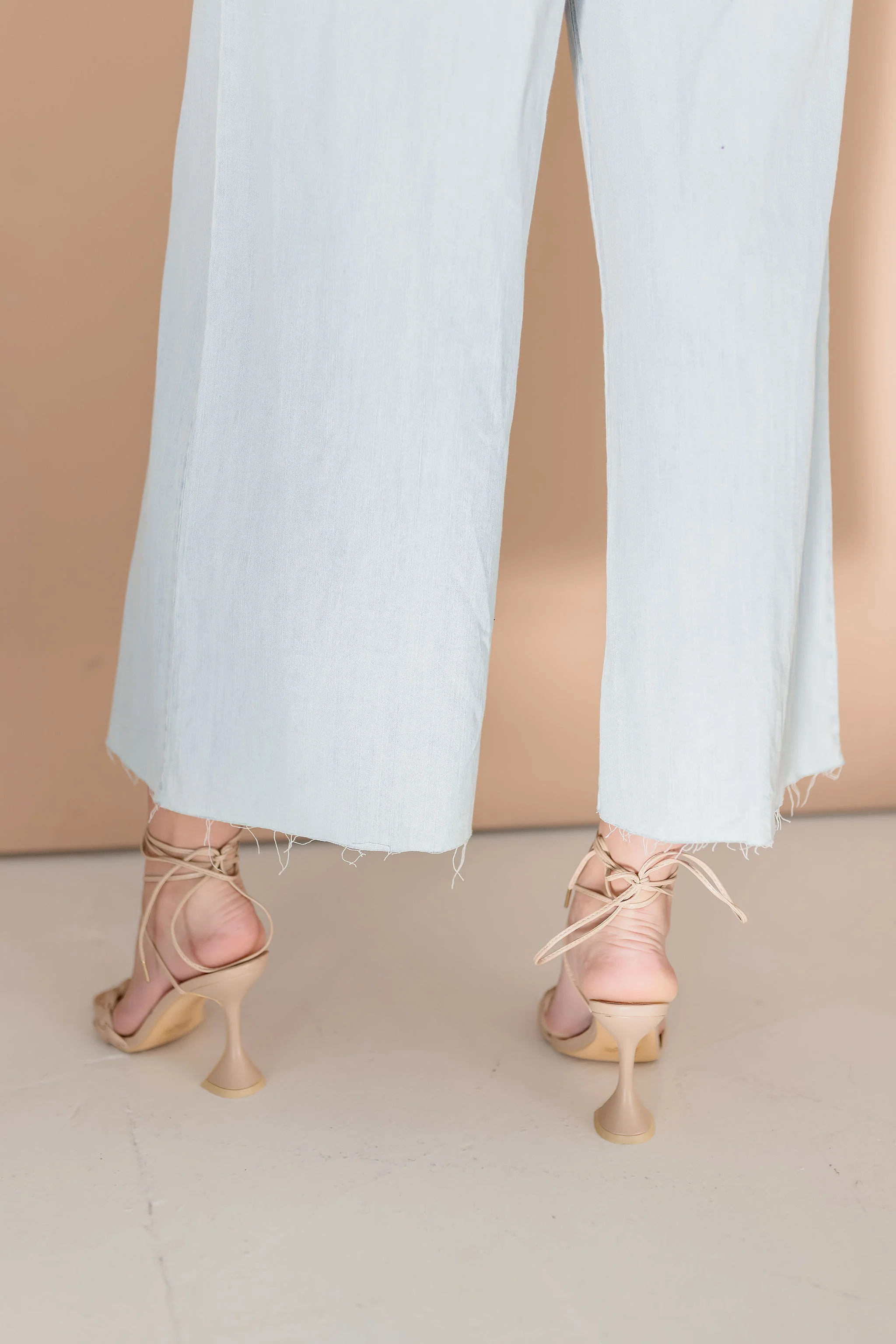 Mindy Sleeveless Criss Cross Back Denim Jumpsuit Blue