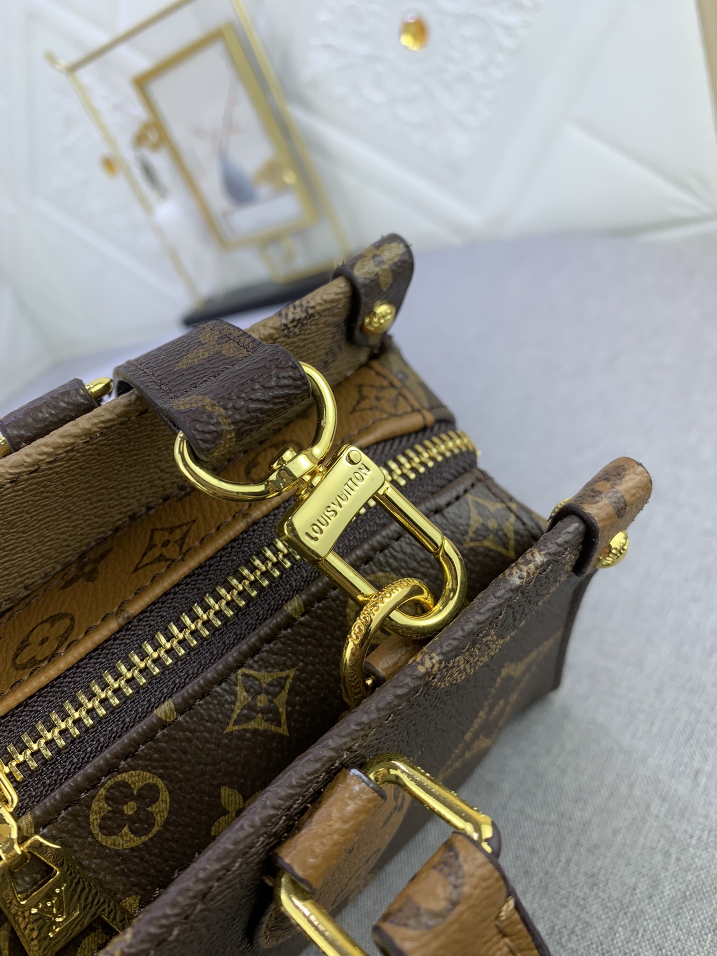 Louis Vuitton OnTheGo East West M23640 (2) 25 x 13 x 10cm